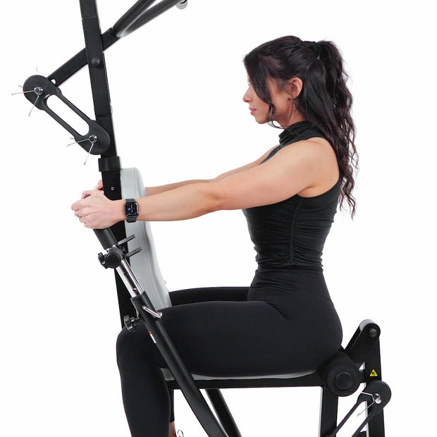 Woman Sitting Facing MB 1000 All-In-One Home Gym